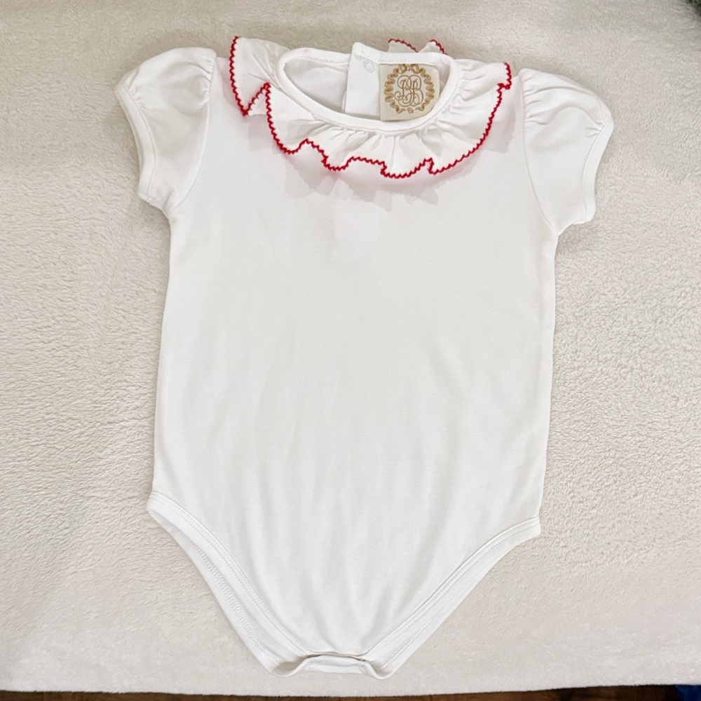 The Beaufort Bonnet Company Onesie with Ruffle Collar trimmed in Red.